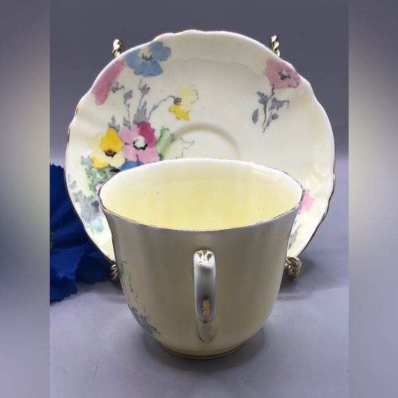 Crown Staffordshire Teacup & Saucer Pale Yellow w/Blue, Pink, and Yellow Flowers - Picture 4 of 10